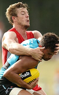 Luke Parker lays a tackle on Brendon Ah Chee in the Swans' win. Picture: Getty Images - ${keywords}